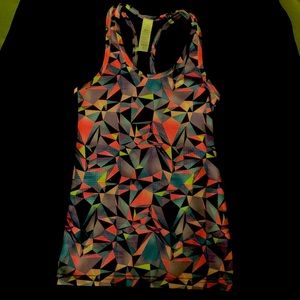 Ivivva size 8 racerback tank in pink, purple, blue kaleidoscope pattern